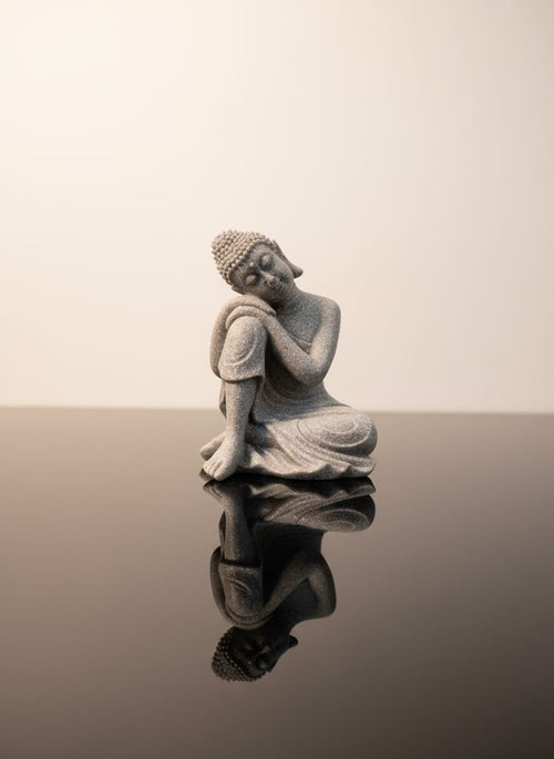 Relaxed Buddha Hugging Knee Statue